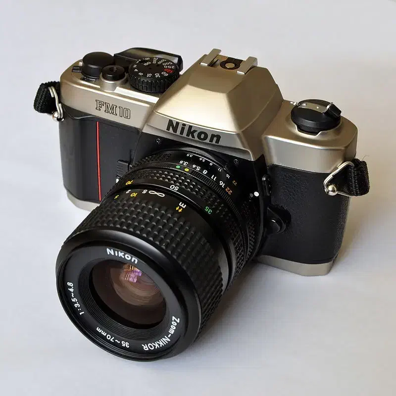 دو عدد دوربین اورجینال نیکون nikon fm10 با جعبه|دوربین عکاسی و فیلم‌برداری|تهران, اکباتان|دیوار