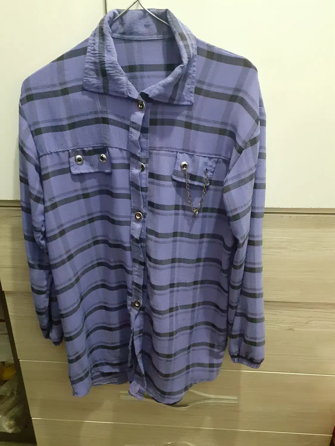 لباس|لباس|مشهد, خین عرب|دیوار