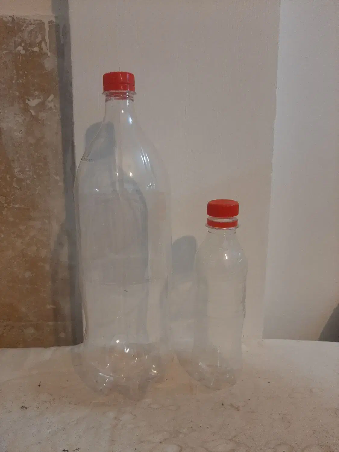 شیشه نوشابه کوکا|ظروف نگهدارنده، پلاستیکی، یک‌بارمصرف|مشهد, سرافرازان|دیوار