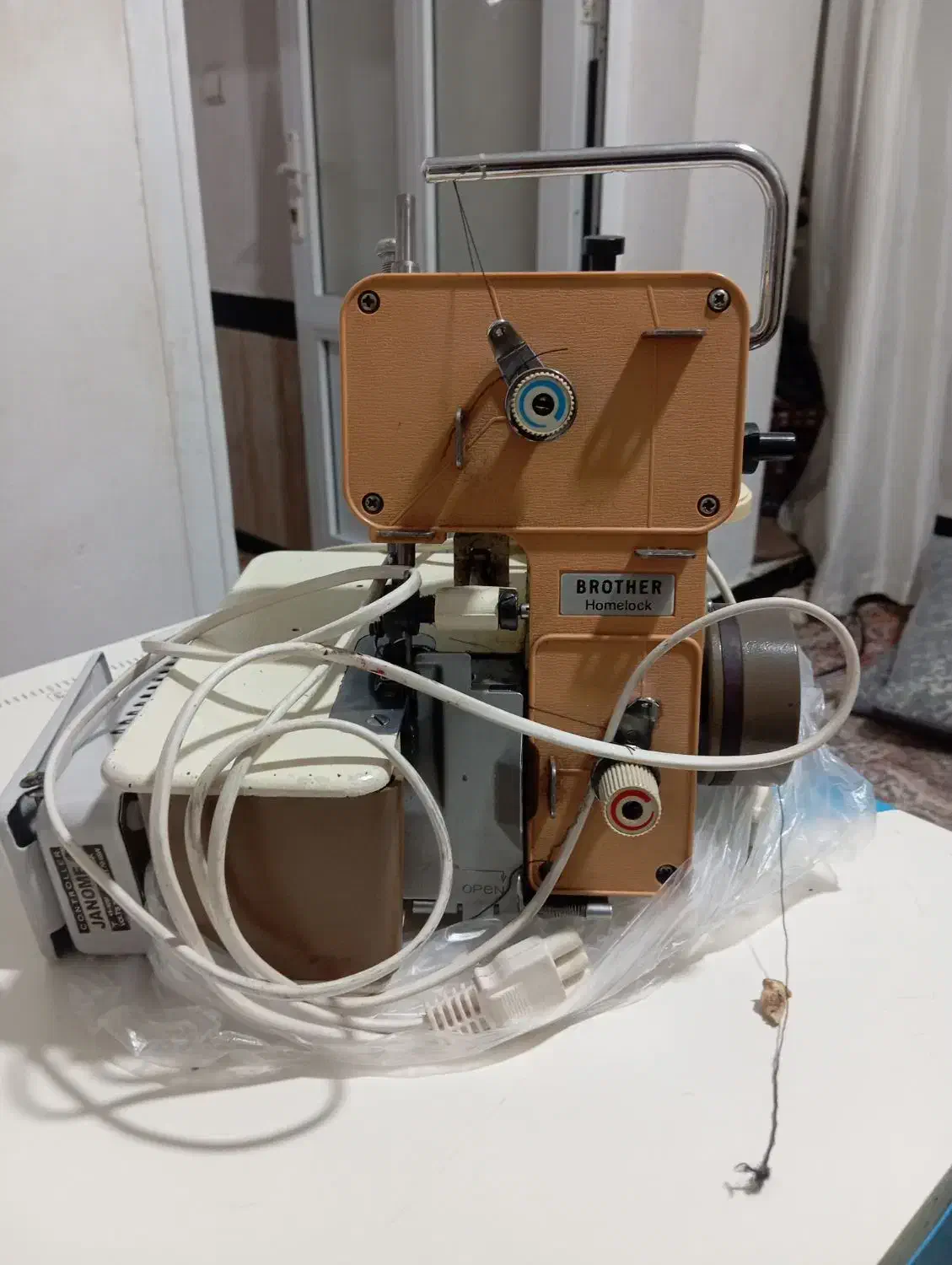 فروش‌سردوز|چرخ خیاطی و ریسندگی|ربط, |دیوار