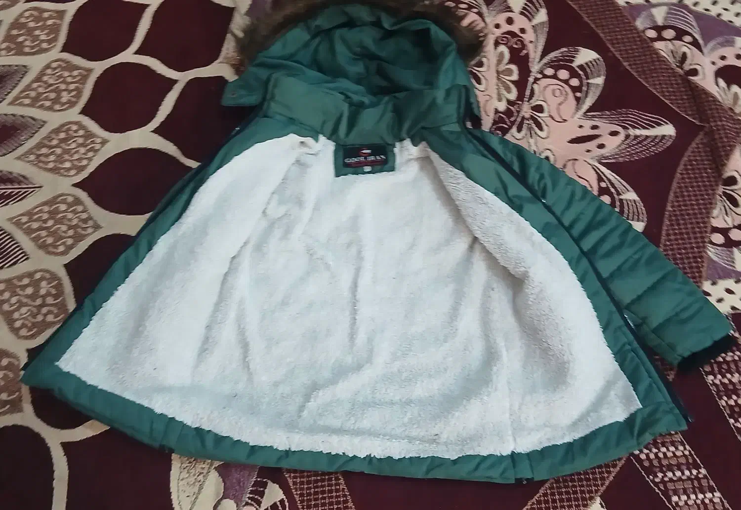 کاپشن|لباس|اندیمشک, |دیوار