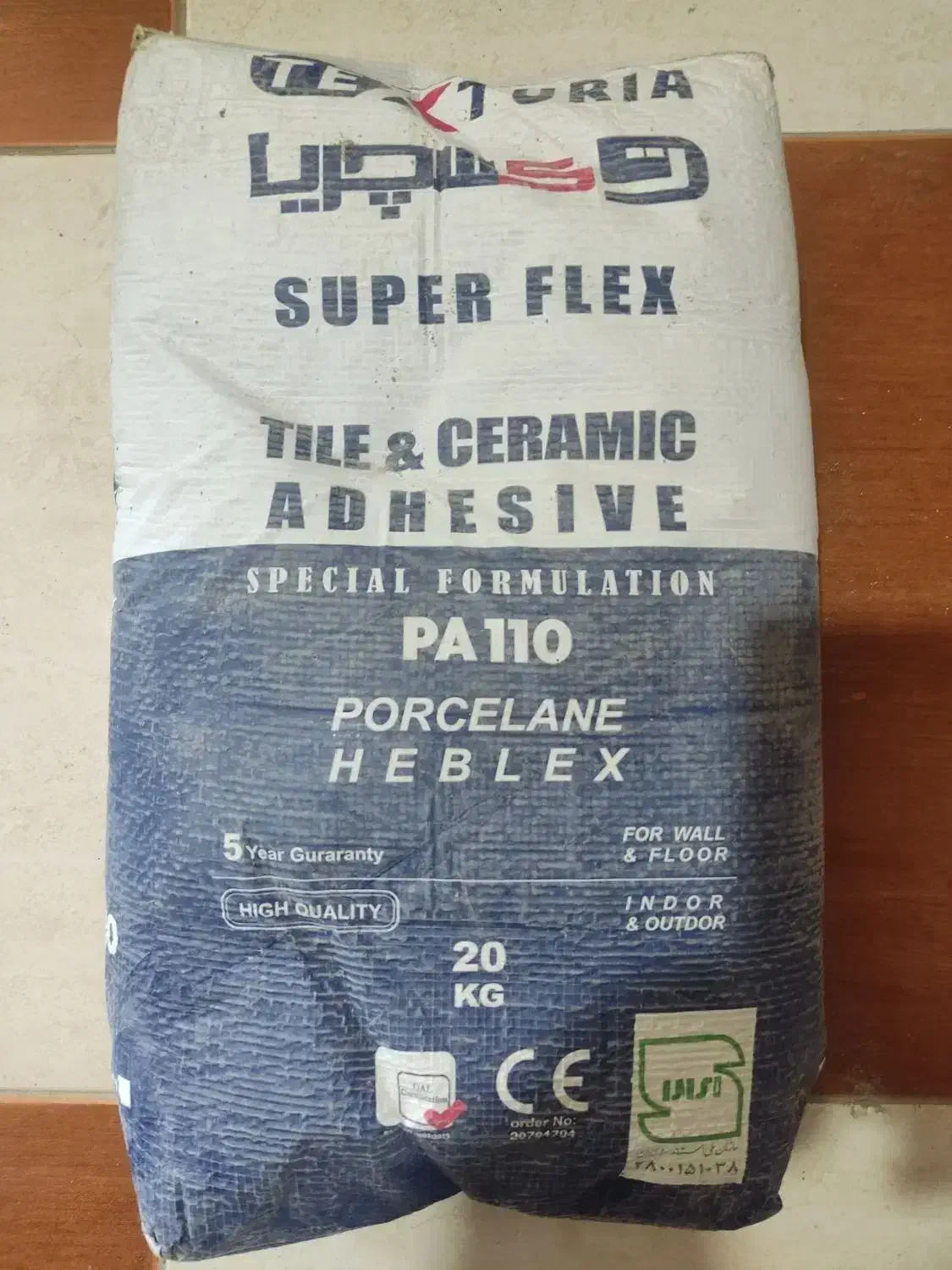 چسب پرسلانی پودری تاکسچریا وکاشی وسرامیک|مصالح و تجهیزات ساختمان|آباده, |دیوار