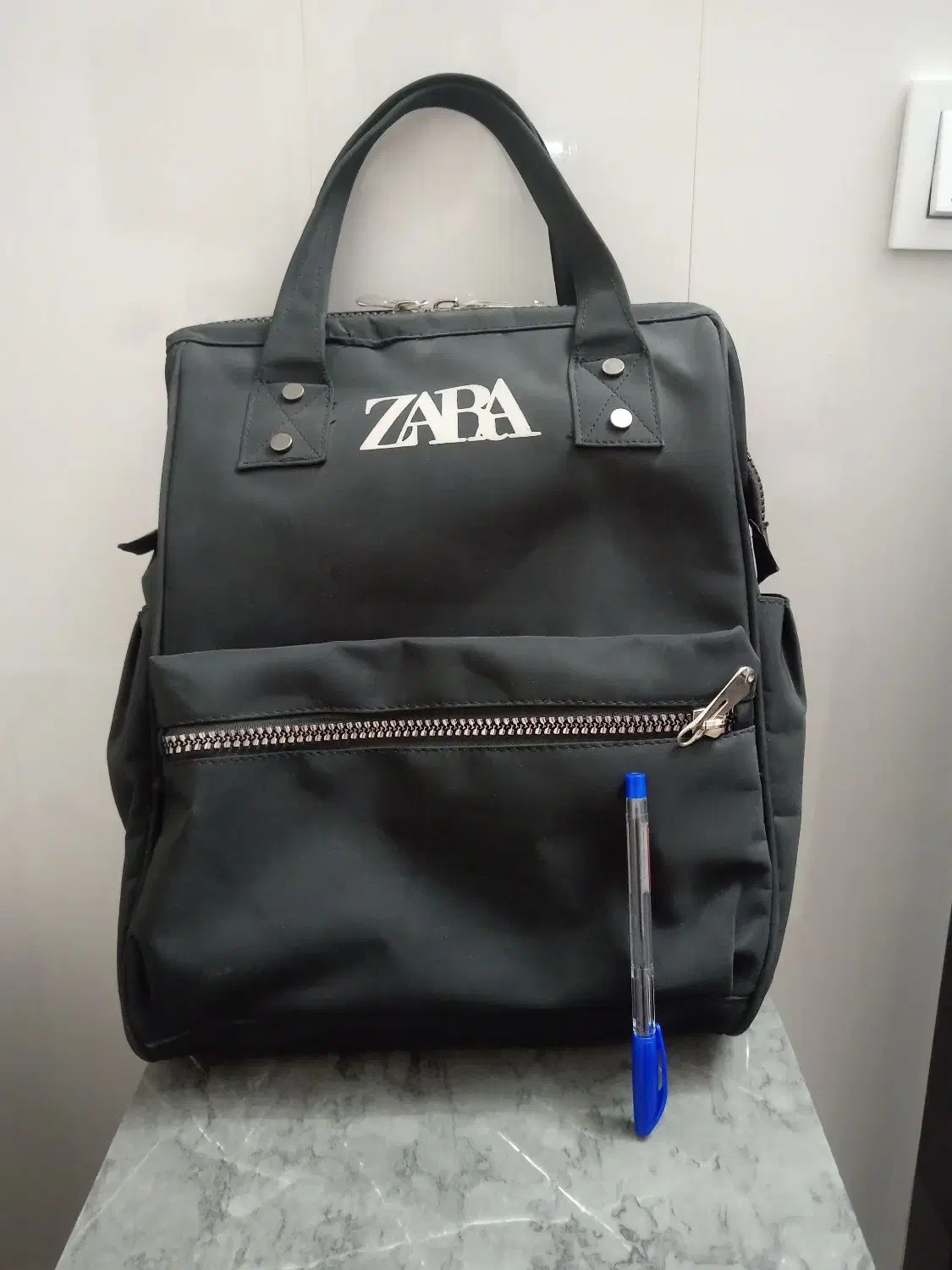 کوله مدرسه|کیف، کفش، کمربند|مشهد, عامل|دیوار