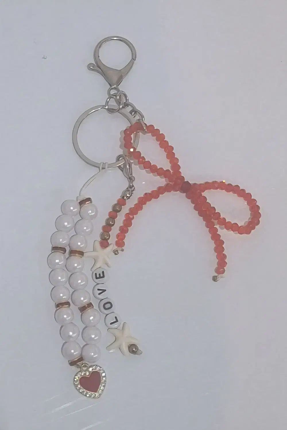 آویز کیف و جاکلیدی پاپیون قرمز|کیف، کفش، کمربند|کامیاران, |دیوار