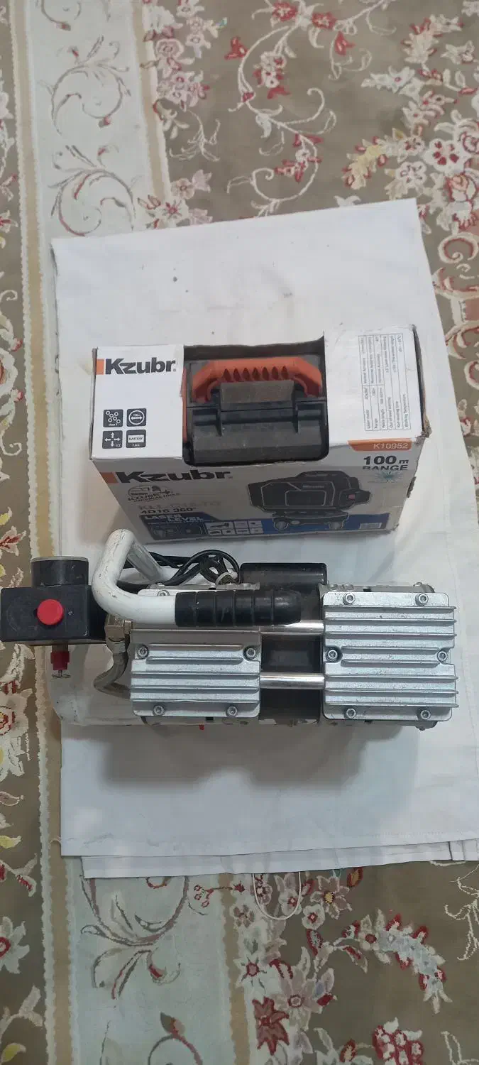 تراز لیزری و پمپ باد ۱۰لیتری|حراج|کلیبر, |دیوار