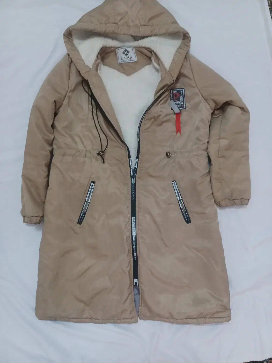 کاپشن زنانه|لباس|قدس, شهرقدس|دیوار