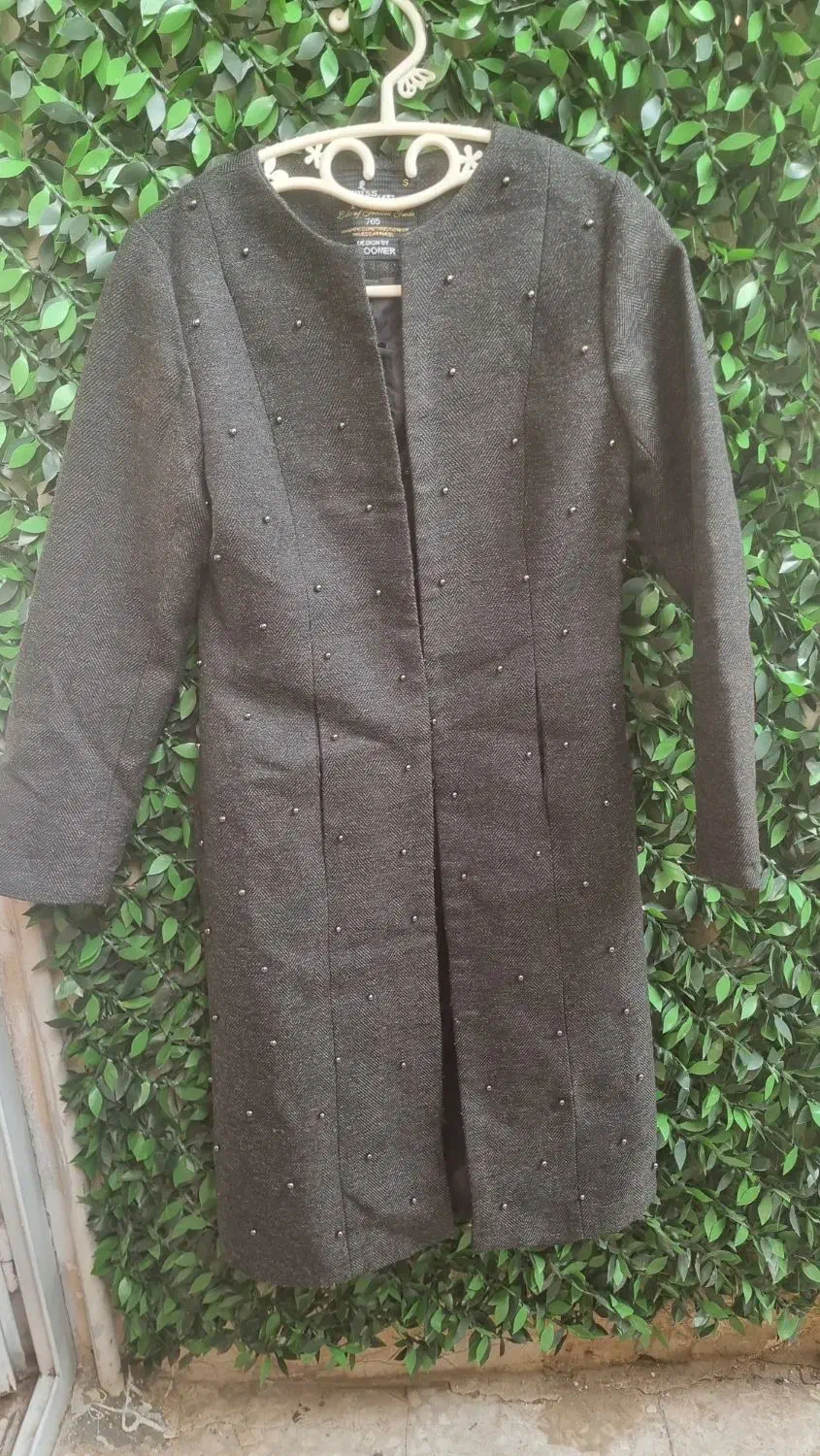 پالتو|لباس|قم, مصلاء|دیوار