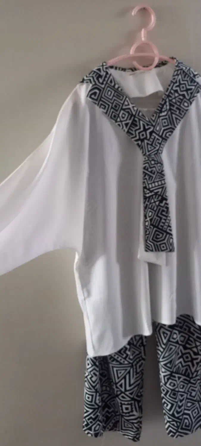 شومیز و شلوار|لباس|رباط‌کریم, مسکن مهر آبشناسان|دیوار