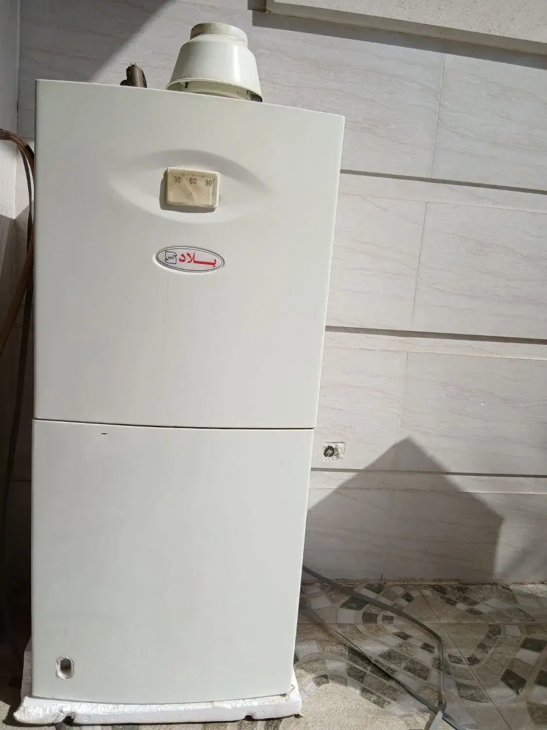 فروش آبگرمکن دیواری ۵۰ لیتری بلاد کارکرده.|آبگرمکن، پکیج، شوفاژ|جهرم, |دیوار