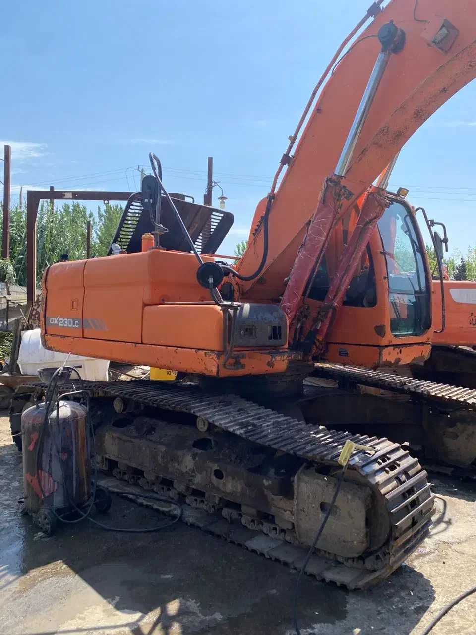 بیل مکانیکی زنجیری دوسان دی ایکس|خودرو سنگین|کوهی‌خیل, |دیوار