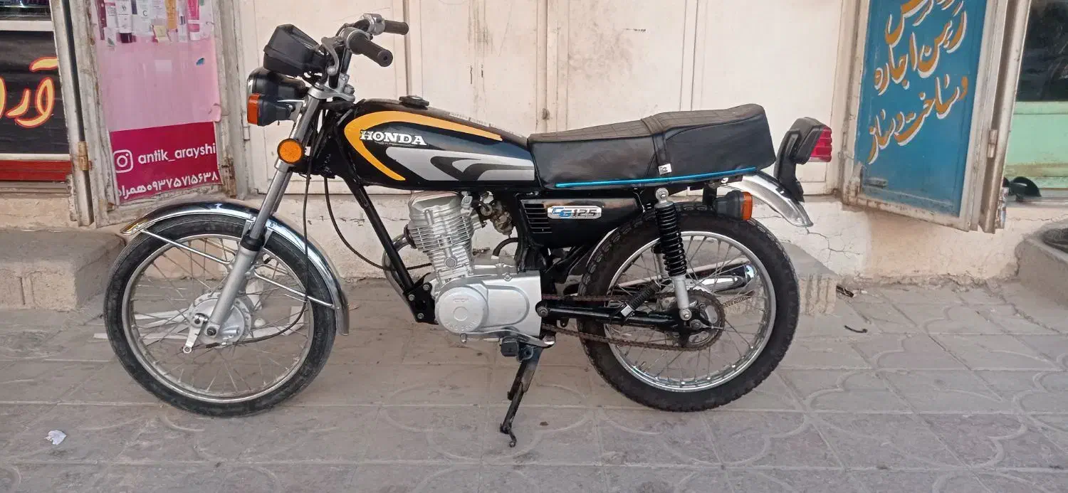 موتور 125|موتورسیکلت|آبپخش, |دیوار
