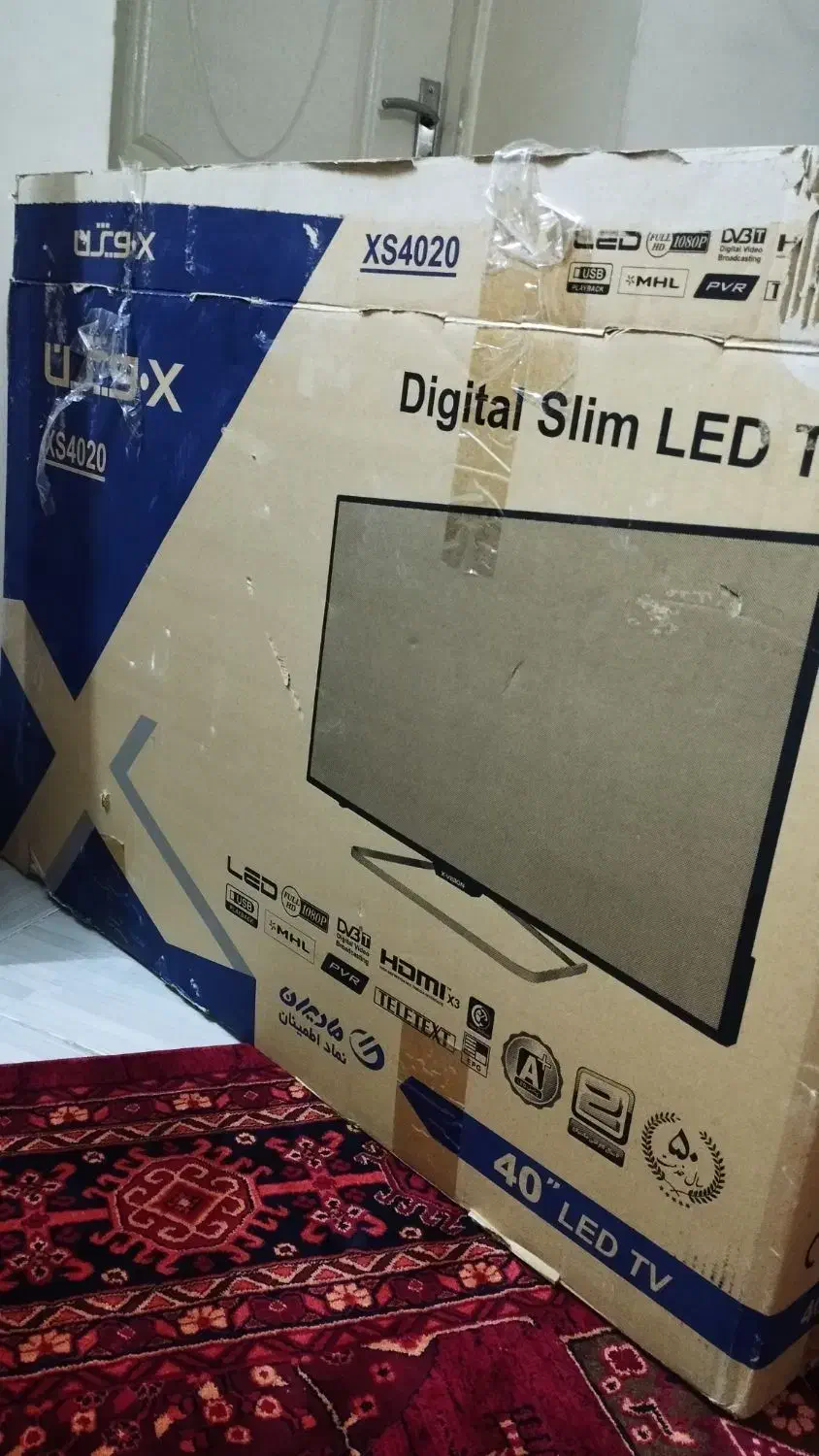 تلویزیون ۴۰ اینچ Xvision|تلویزیون و پروژکتور|تویسرکان, |دیوار