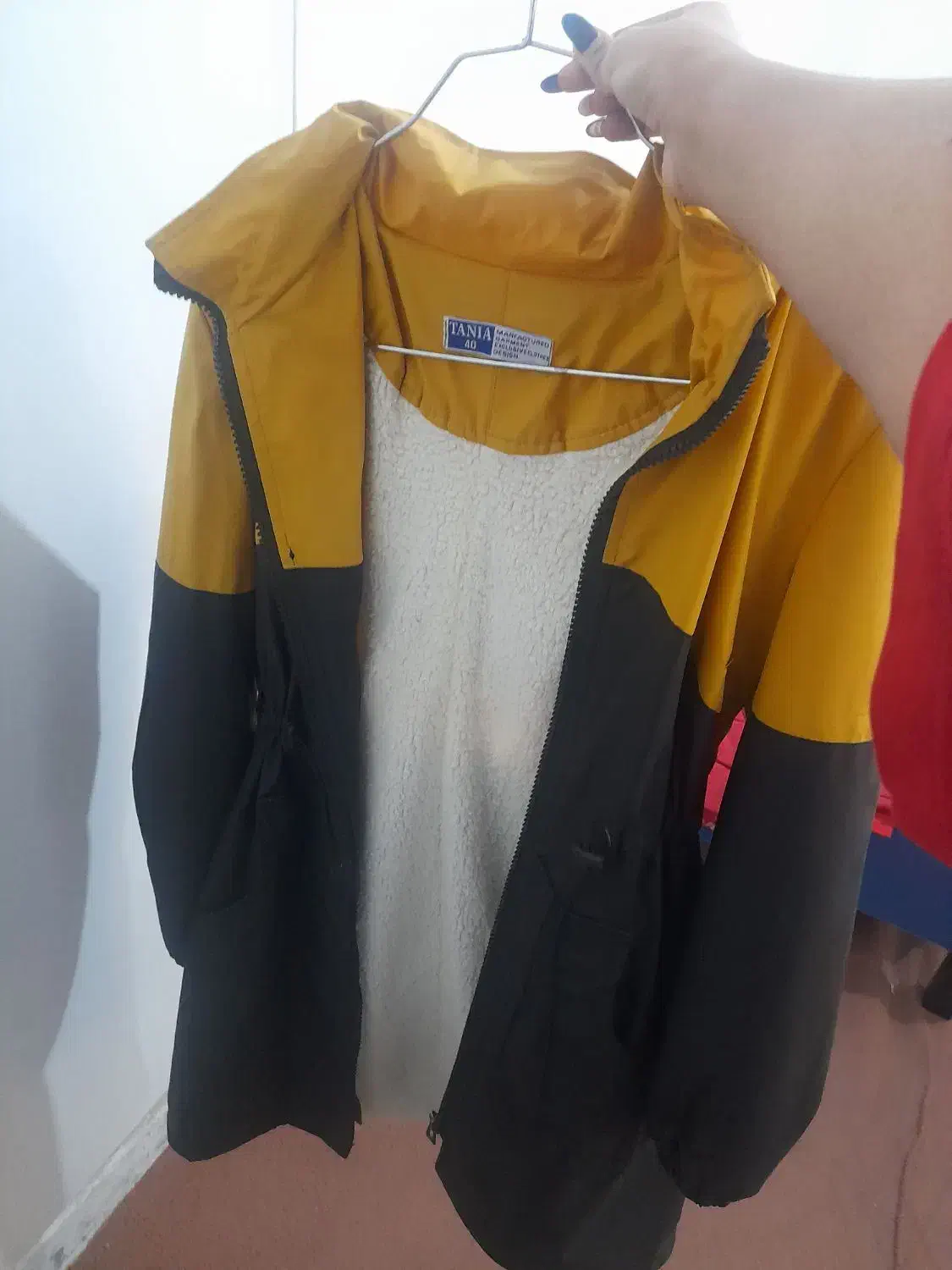 کاپشن|لباس|اندیمشک, |دیوار