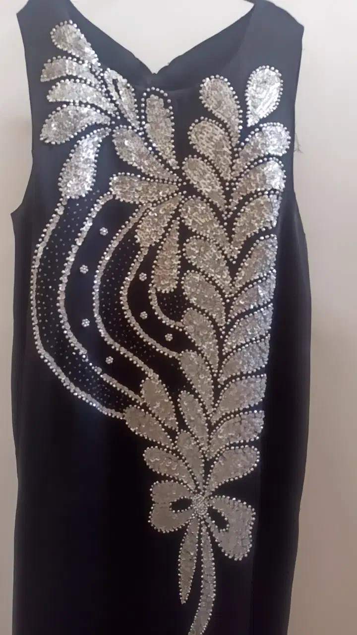 لباس مجلسی|لباس|ملکشاهی, |دیوار