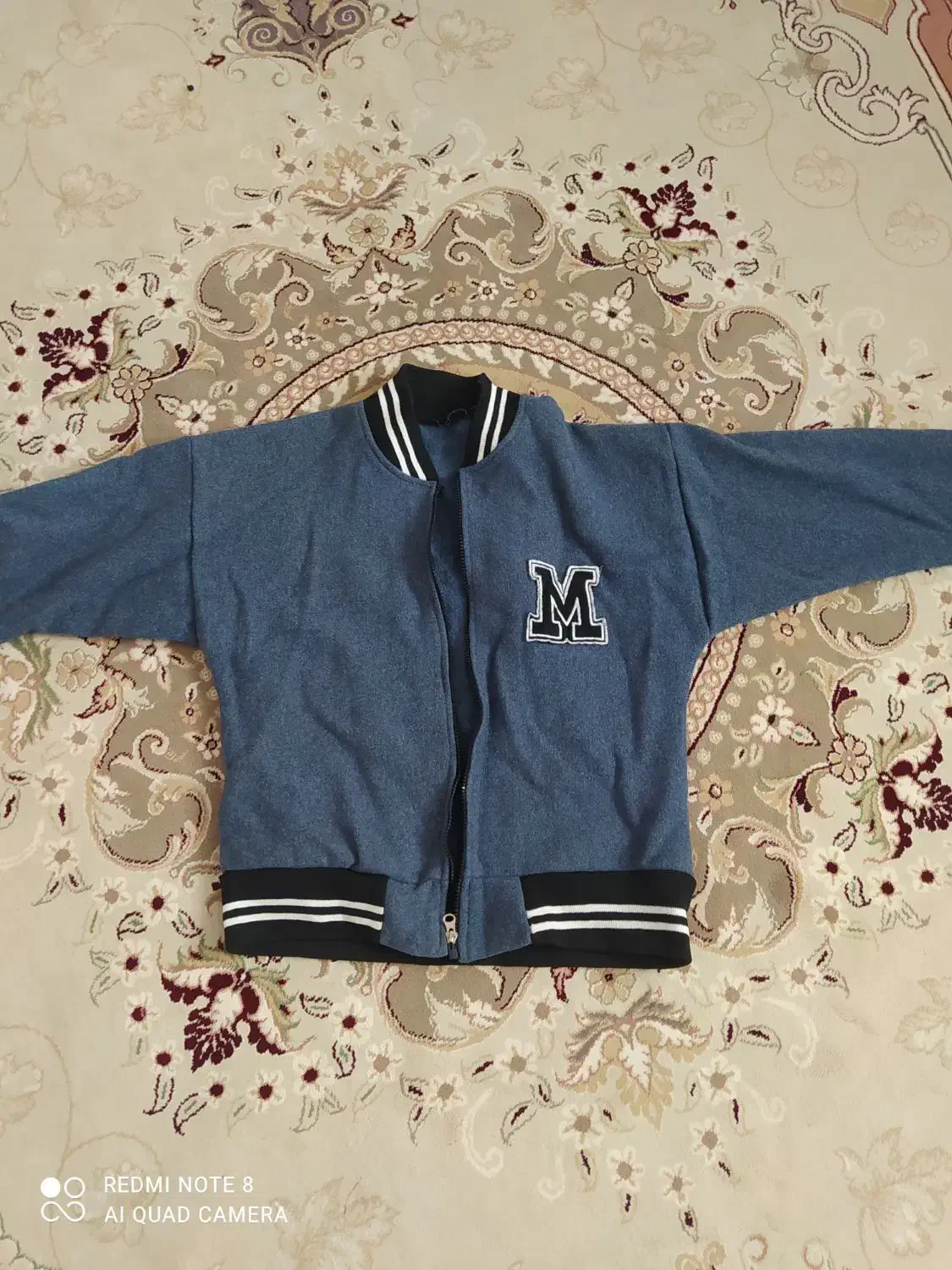 کابشن|لباس|خرم‌آباد, |دیوار