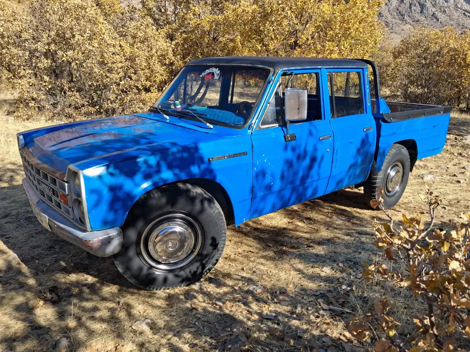 نیسان دوکابین مدل ۱۳۷۲ از دور چند لکه رنگ|خودرو سواری و وانت|جوانرود, |دیوار