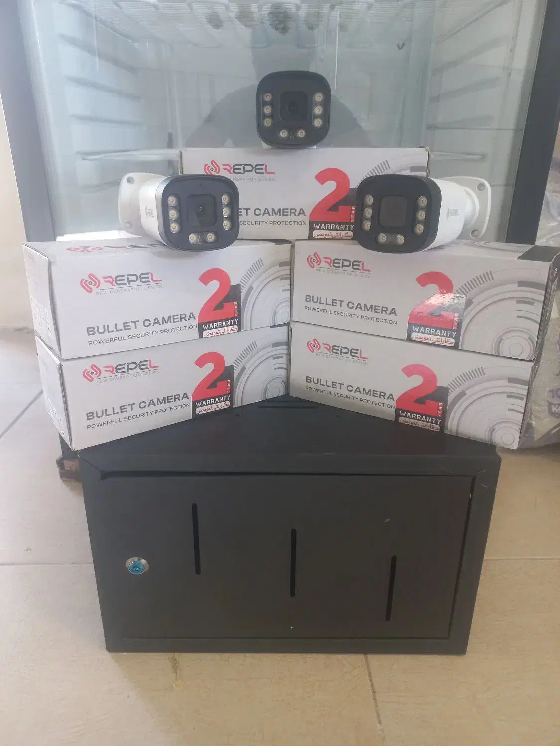 دوربین‌مداربسته ،درب برقی ،جک برقی ،شیشه سکوریت|خدمات پیشه و مهارت|رفسنجان, |دیوار