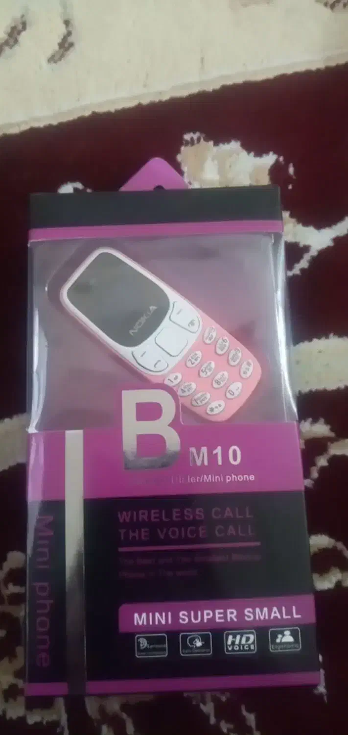 گوشی بند انگشتی|موبایل|قم, نیروگاه|دیوار