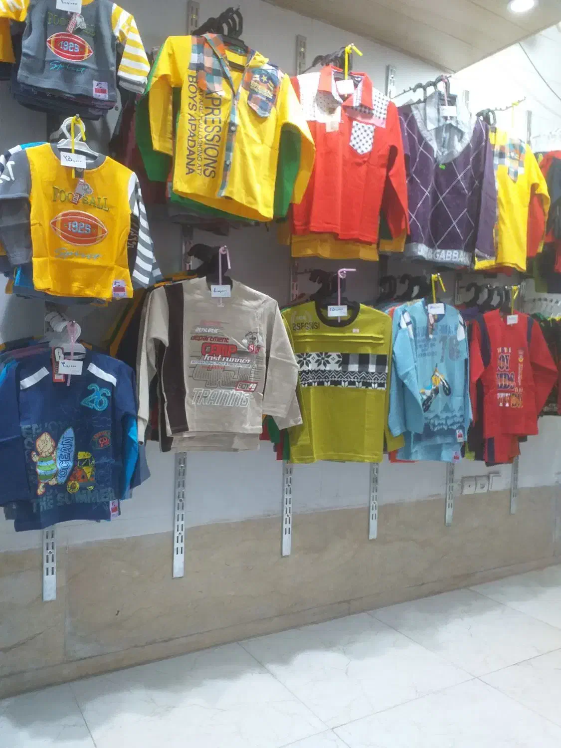 پوشاک نوبهار|لباس|اهواز, زندوکیلی|دیوار