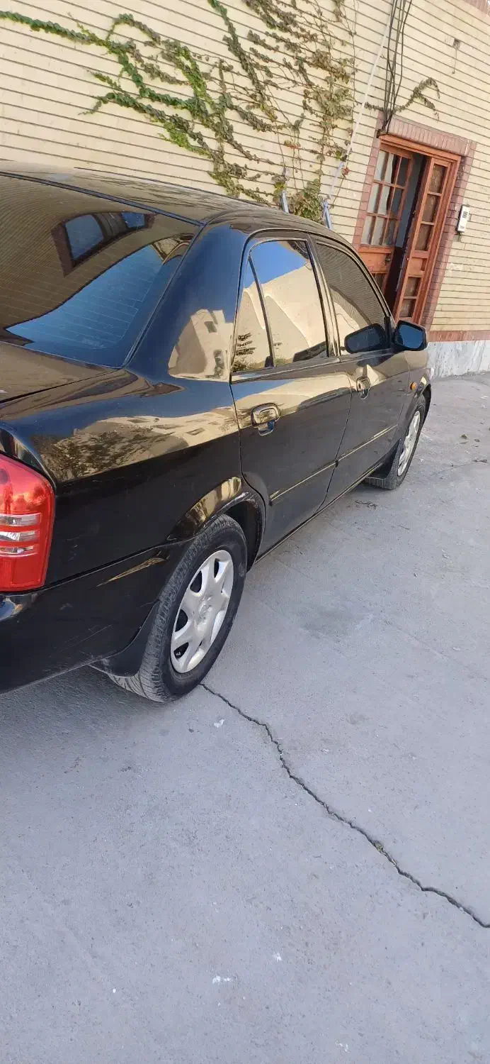 مزدا۳۲۳کارمندی سانروف برقی|خودرو سواری و وانت|سیرجان, |دیوار