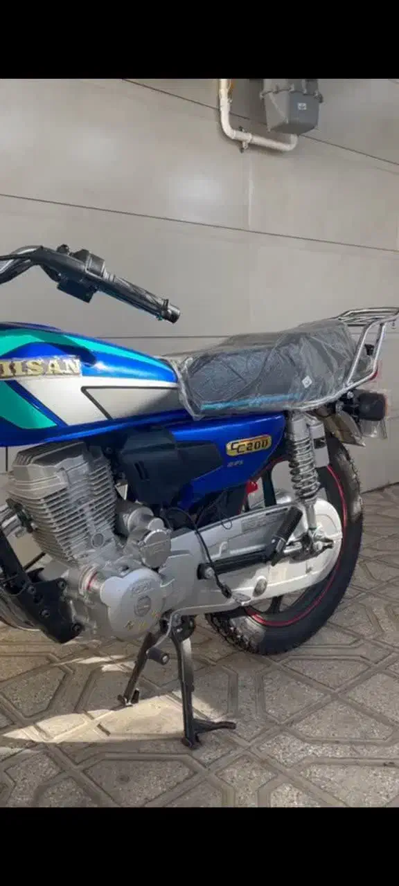 احسان ۲۰۰ خشک|موتورسیکلت|بردسکن, |دیوار