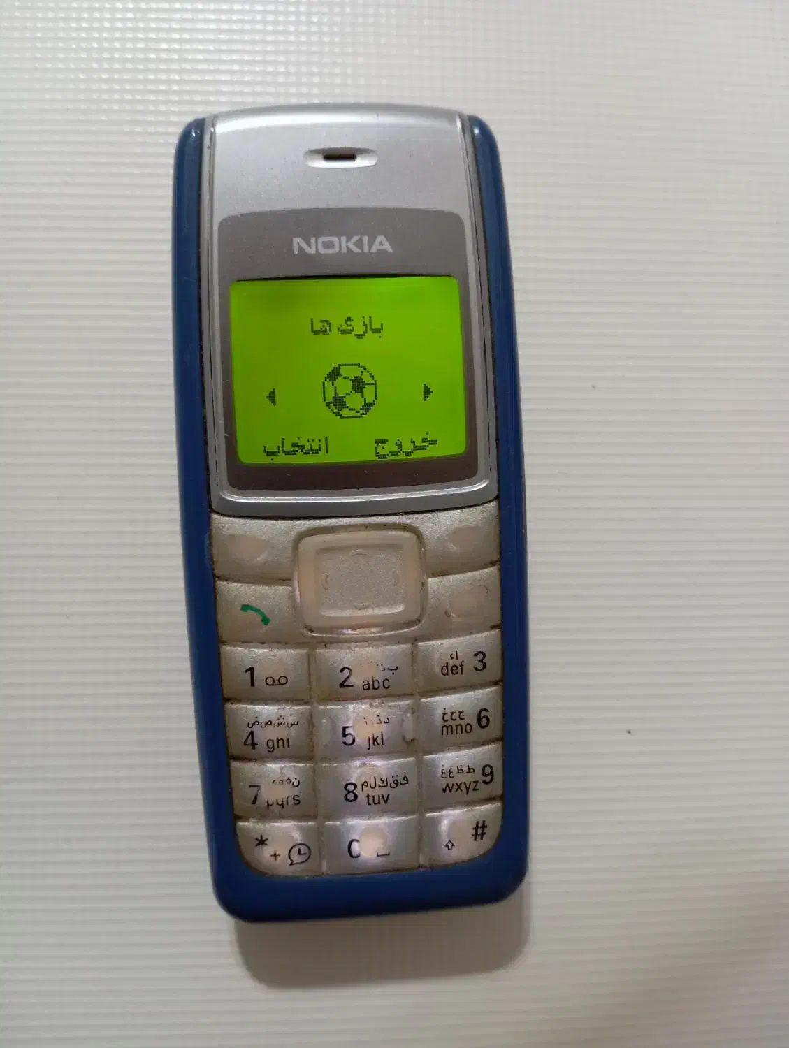 نوکیا 1110|موبایل|ایوانکی, |دیوار