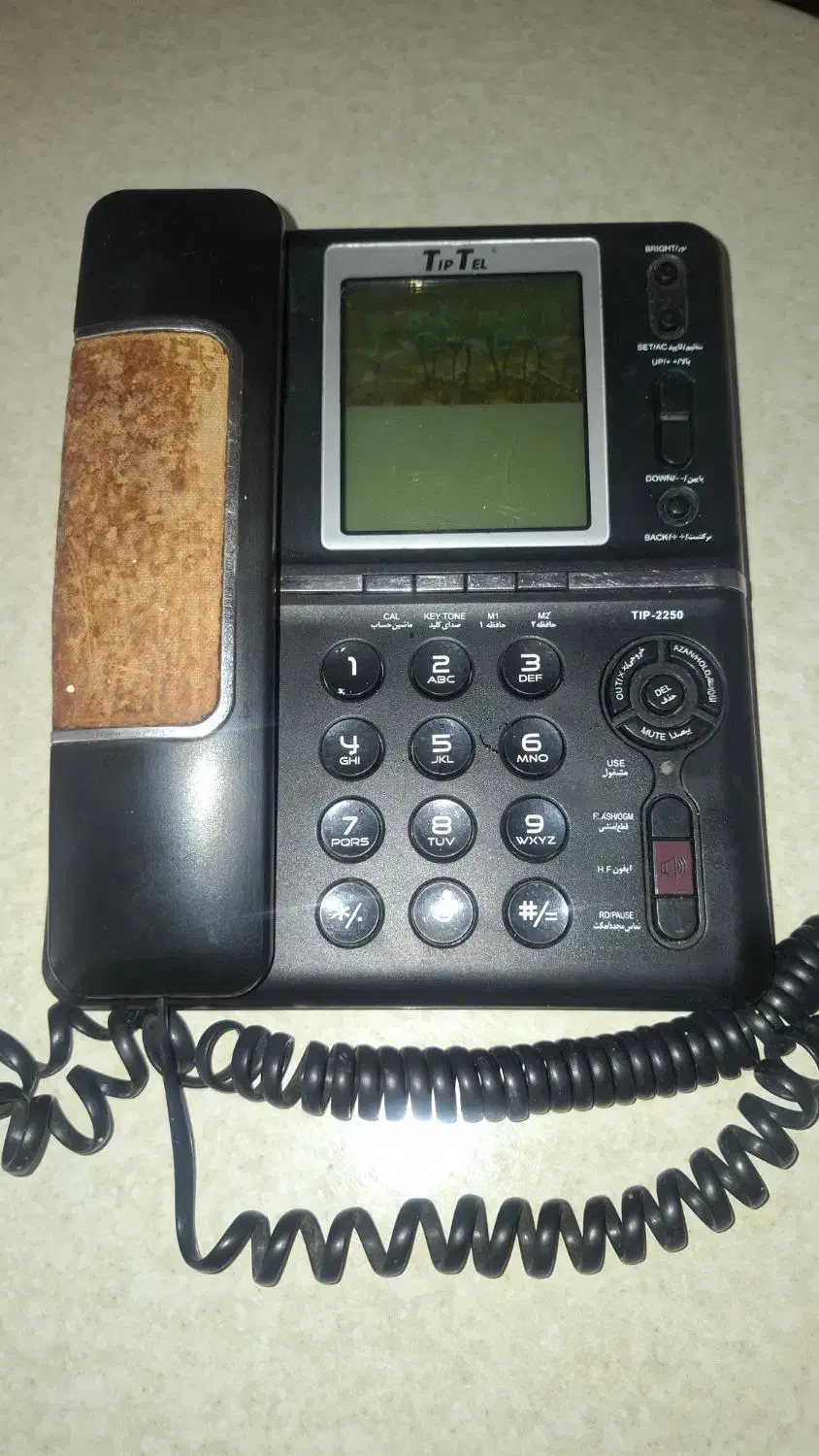 گوشی تلفن|تلفن رومیزی|ری, شهادت|دیوار