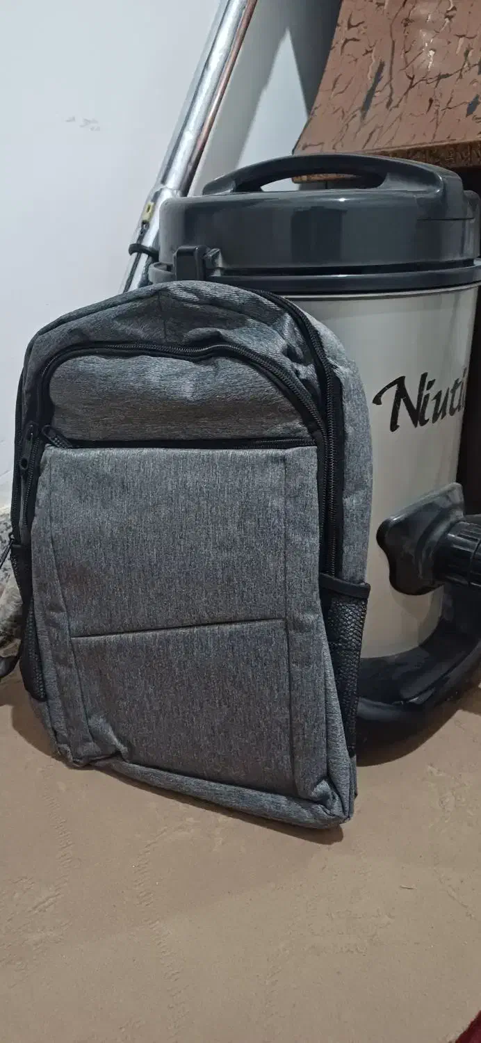 کولهپشتی|کیف، کفش، کمربند|مشهد, رده|دیوار