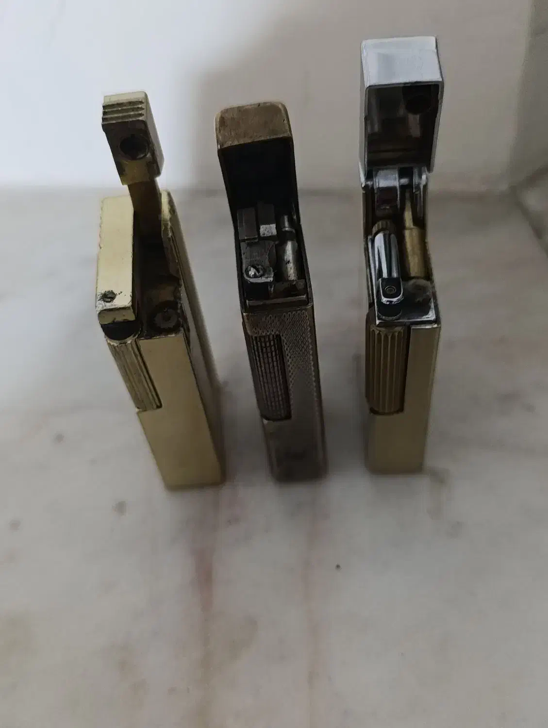 فندک دانهیل سویسی|کلکسیون اشیاء عتیقه|رودهن, |دیوار