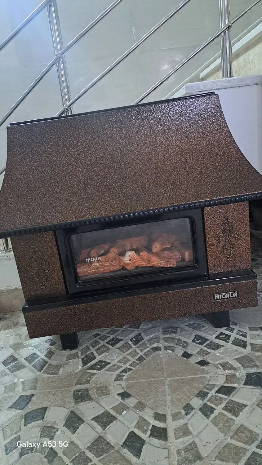 بخاری طرح شومینه در حد نوو|بخاری، هیتر، شومینه|لنگرود, |دیوار