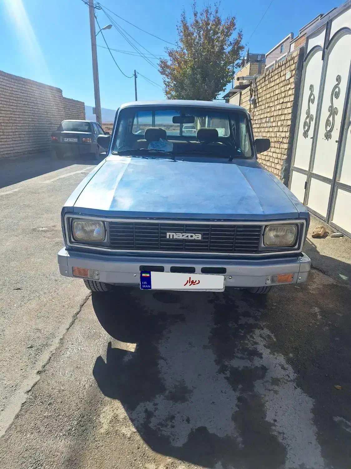 مزدا تک کابین ۲۰۰۰|خودرو سواری و وانت|اصفهان, تخت فولاد|دیوار