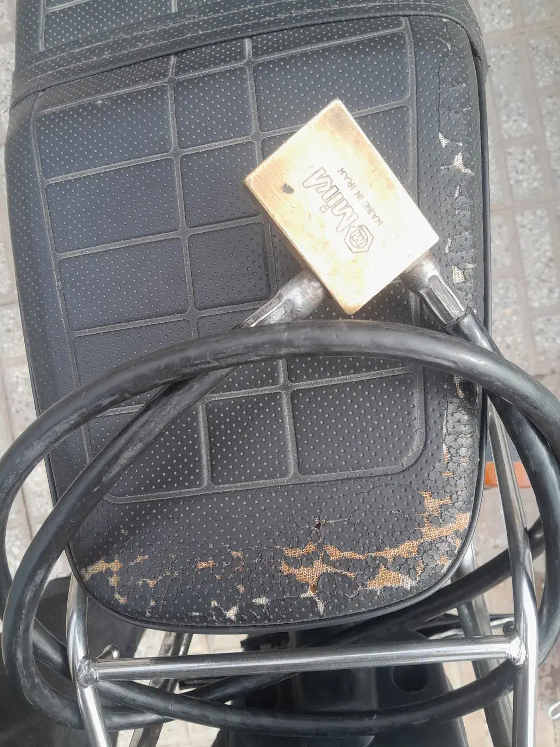 قفل موتور|قطعات یدکی و لوازم جانبی|تربت‌حیدریه, منظر|دیوار