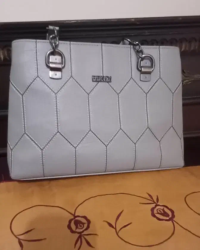 کیف مجلسی|کیف، کفش، کمربند|مشهد, خواجه ربیع|دیوار