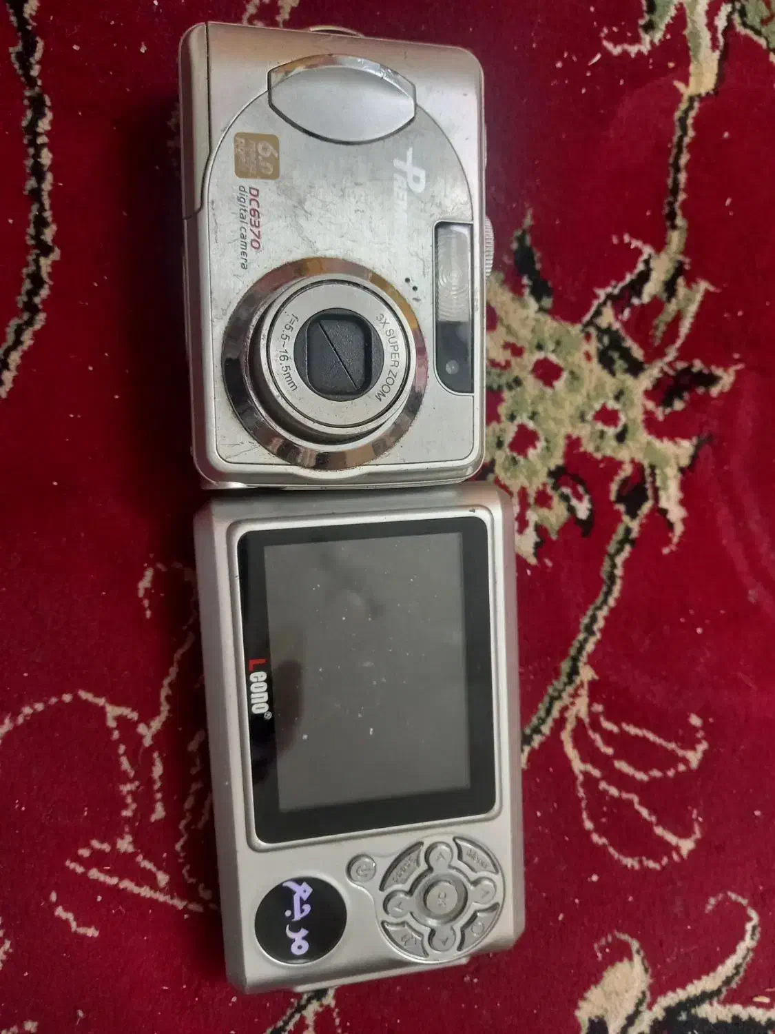 دوربین دیجیتال وقرآن دیجیتال|دوربین عکاسی و فیلم‌برداری|قم, دروازه چوبی|دیوار