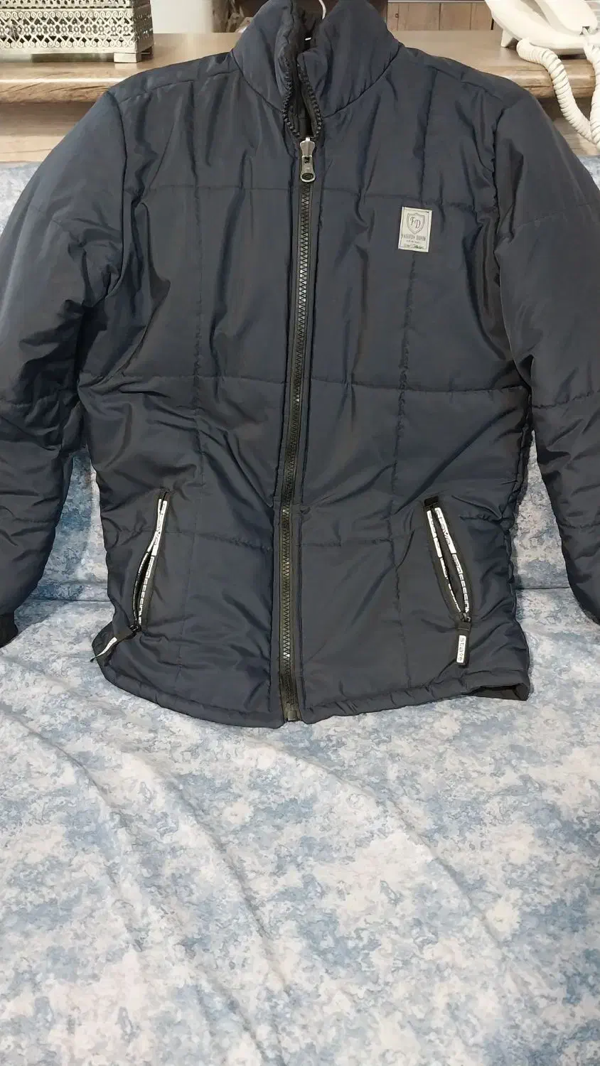 کاپشن|لباس|اصفهان, رسالت|دیوار