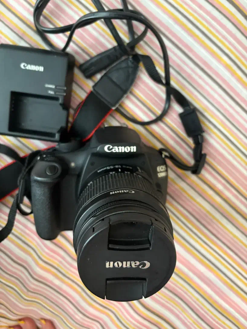 دوربین کنون ۱۲۰۰ دی در حد با لنز|دوربین عکاسی و فیلمبرداری|تهران, هروی|دیوار