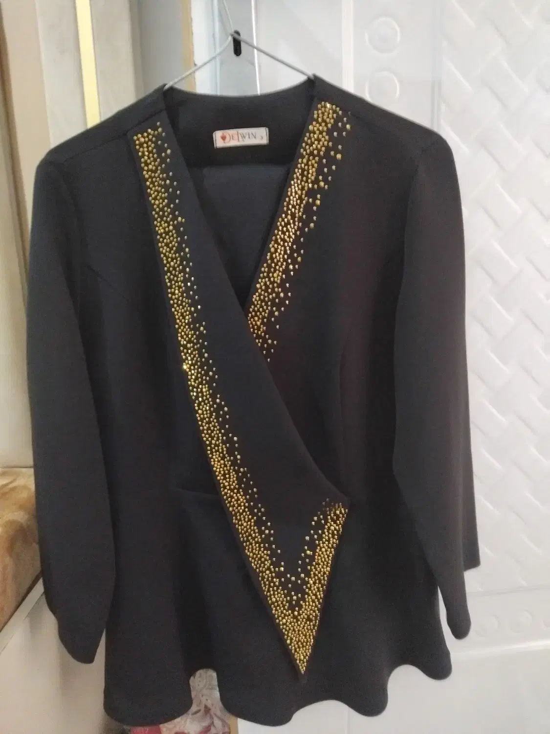 کت مجلسی|لباس|سبزوار, قصبه شرقی|دیوار