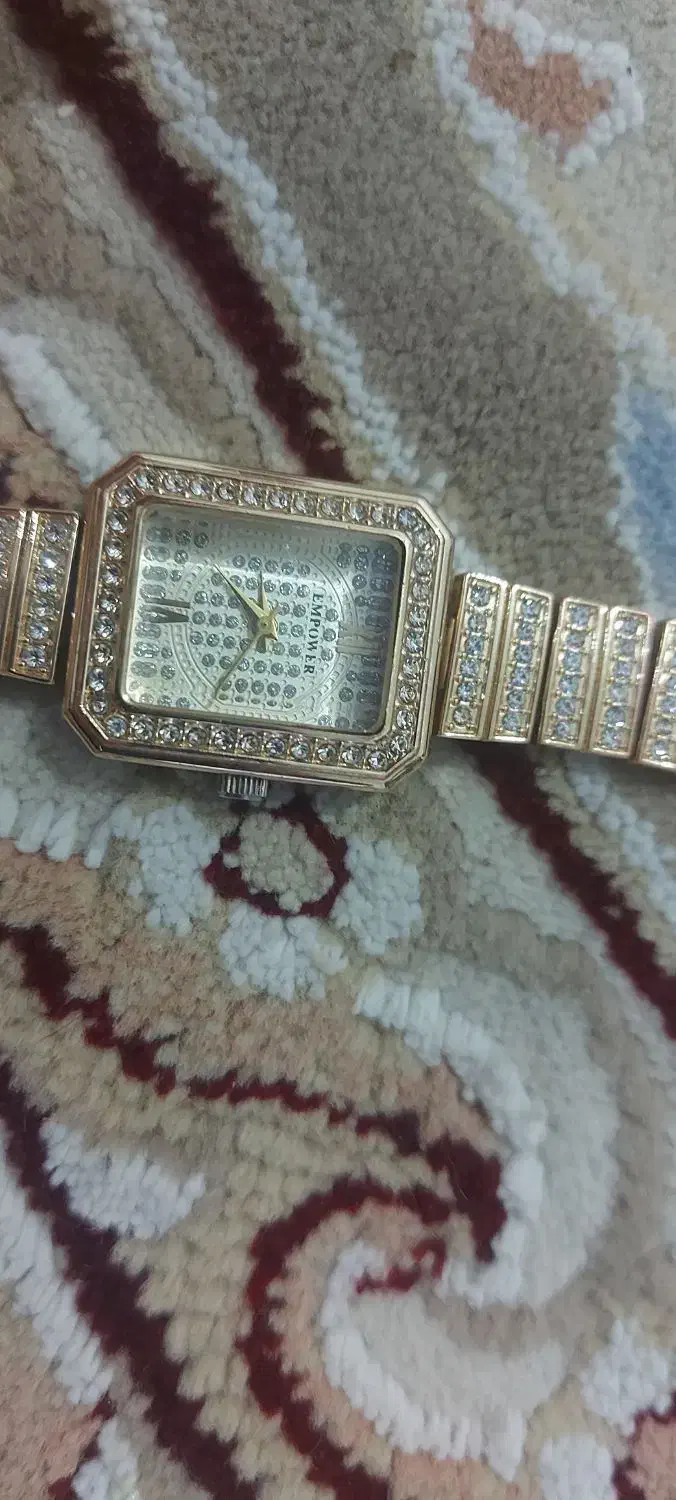 ساعت زیبای طلایی زنانه|ساعت|گرمی, |دیوار