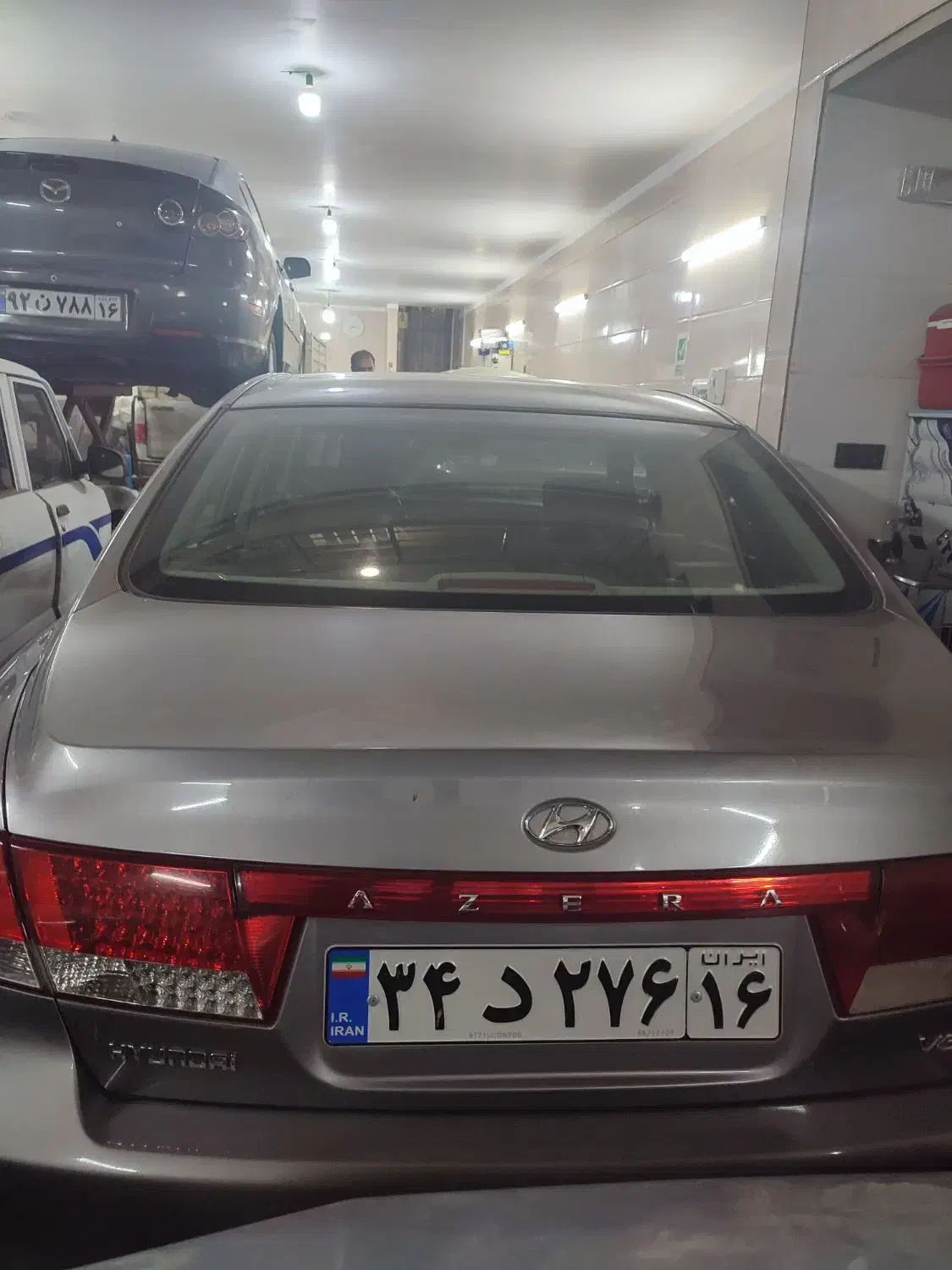 تعمیرگاه تخصصی مزدا|خدمات موتور و ماشین|قم, کوه سفید|دیوار