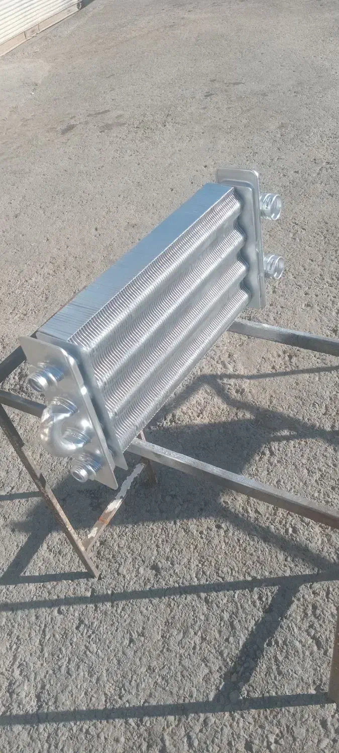 تعمیر انواع مبدل های ایرانی وخارجی|آبگرمکن، پکیج، شوفاژ|سنندج, |دیوار