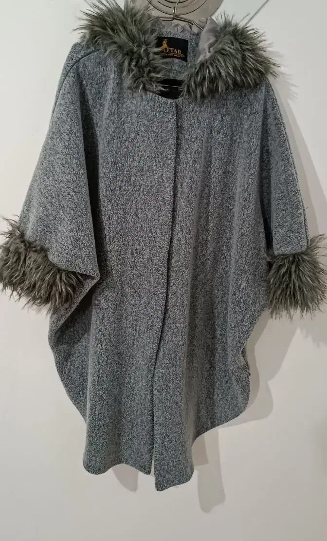 پالتوی زمستانی|لباس|مهاباد (آذربایجان غربی), |دیوار