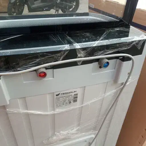 ماشین لباسشویی فریدولین|ماشین لباسشویی و خشک‌کن لباس|قم, دروازه چوبی|دیوار