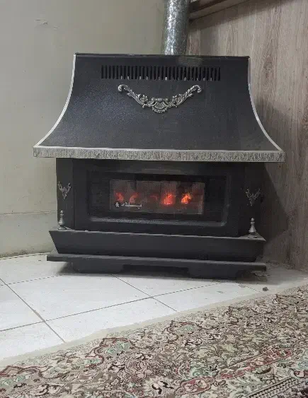 بخاری مدل شومینه مشکی رنگ|بخاری، هیتر، شومینه|تهران, جوادیه|دیوار