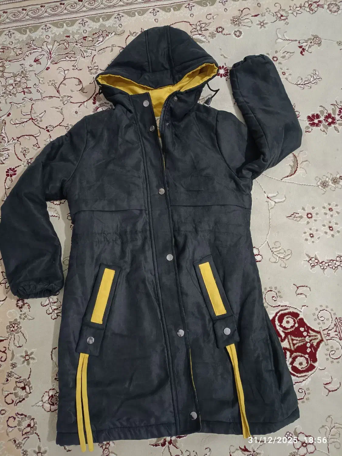 کاپشن|لباس|مشهد, کوی ولیعصر|دیوار