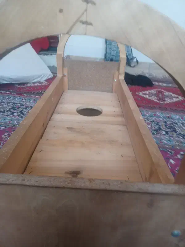 گهواره قدیمی پیچی|کلکسیون اشیاء عتیقه|شیراز, کوشک میدان|دیوار