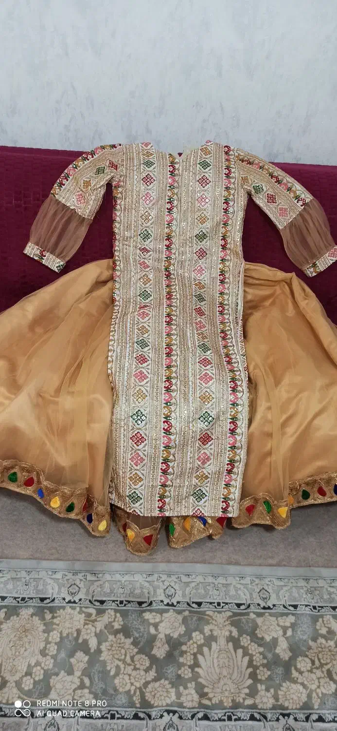 لباس محلی|لباس|مرودشت, استادیوم‎|دیوار