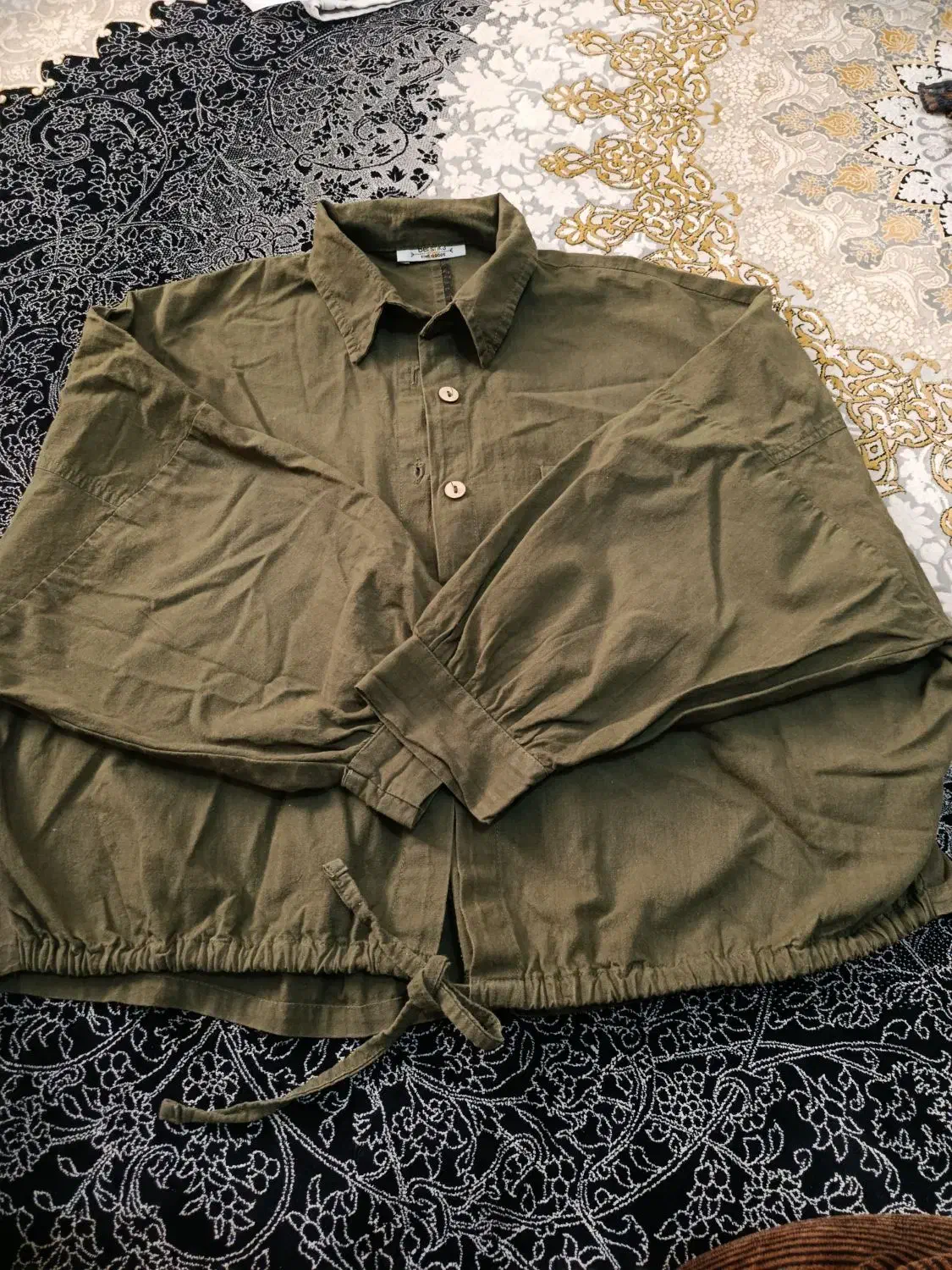 مقداری لباس|لباس|شیراز, دینکان|دیوار