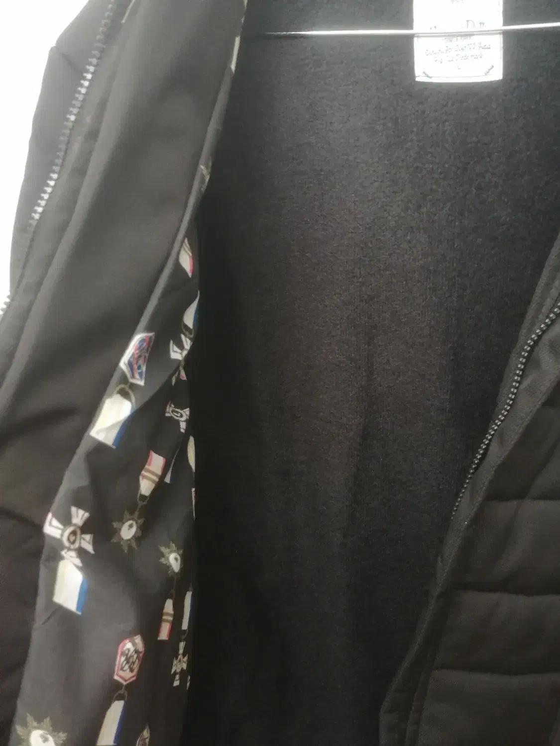 کاپشن|لباس|تربت‌حیدریه, مظفریه|دیوار