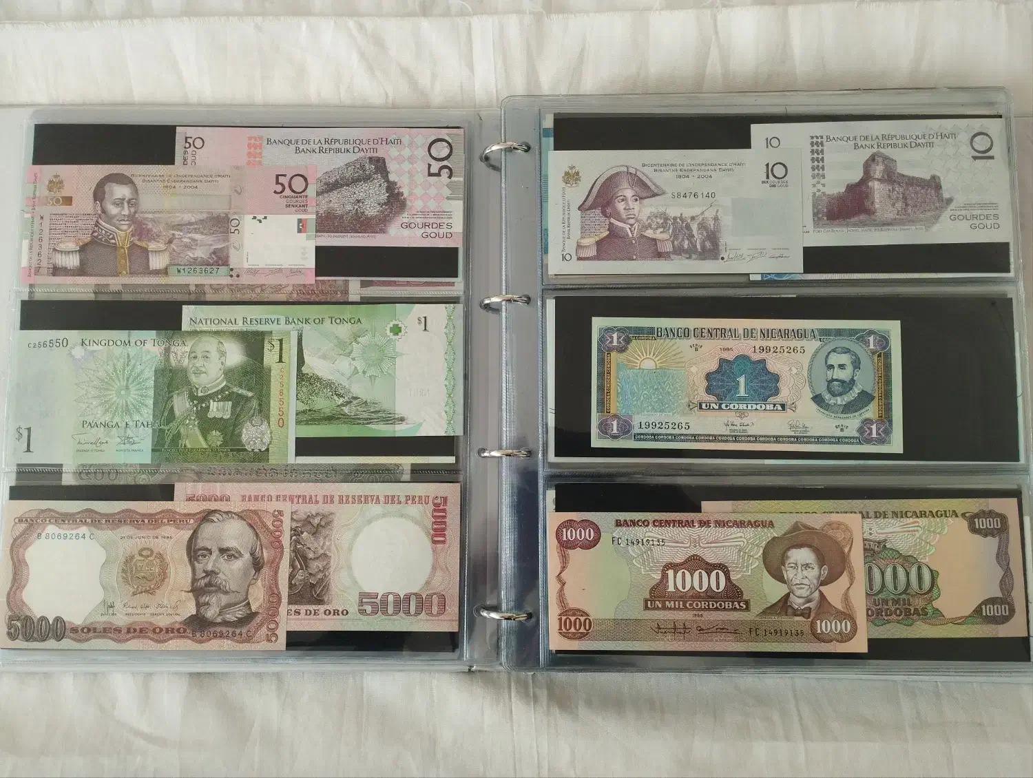 فروش ۲ تا آلبوم اسکناس خارجی تقریباً با ۱۰۰۰ آیتم|کلکسیون سکه، تمبر، اسکناس|بیرجند, |دیوار