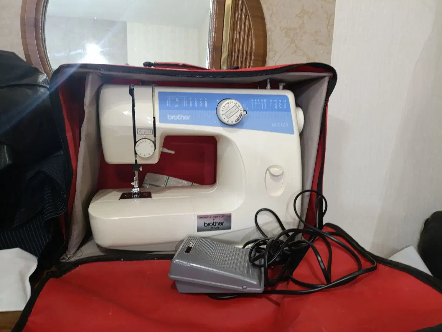 چرخ.خیاطی|چرخ خیاطی و ریسندگی|رباطکریم, رباطکریم|دیوار